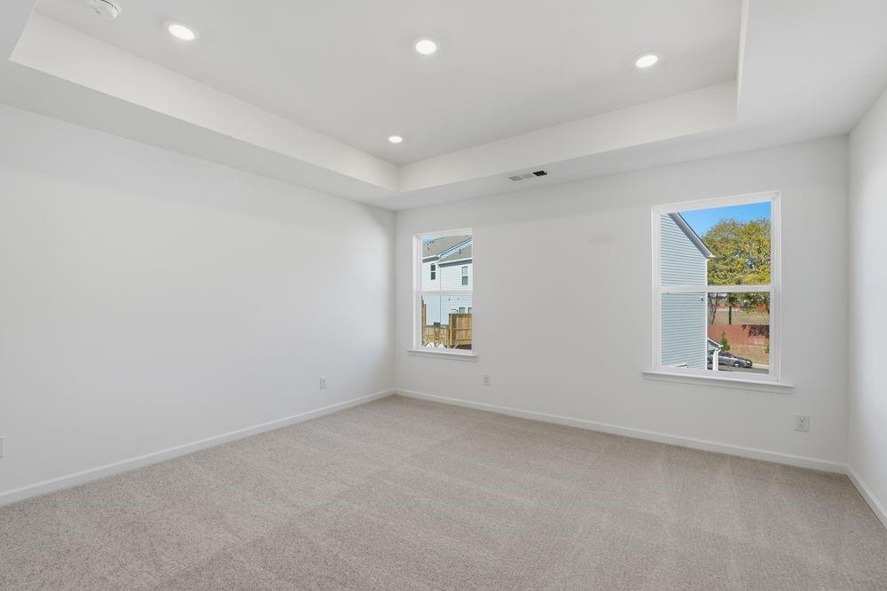 6121 Wayburn Street Tucker, GA 30084 - Photo 18 of 47 an empty room with windows