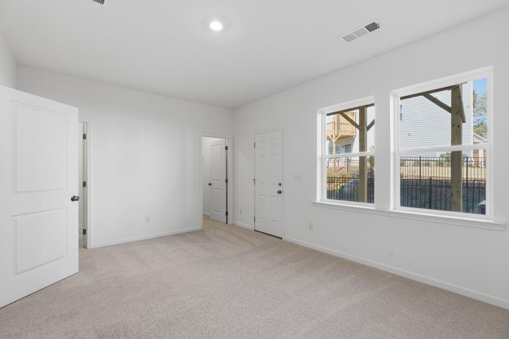 6121 Wayburn Street Tucker, GA 30084 - Photo 3 of 47 a view of an empty room with a window