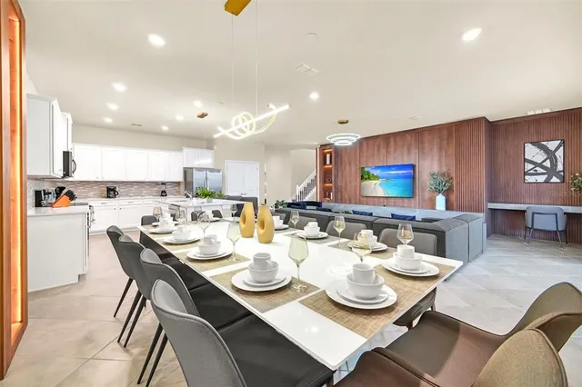 a bedroom with a bed and a table