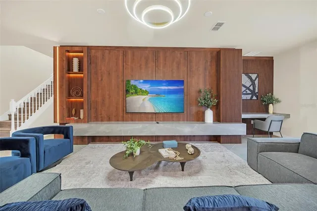 a living room with furniture and window