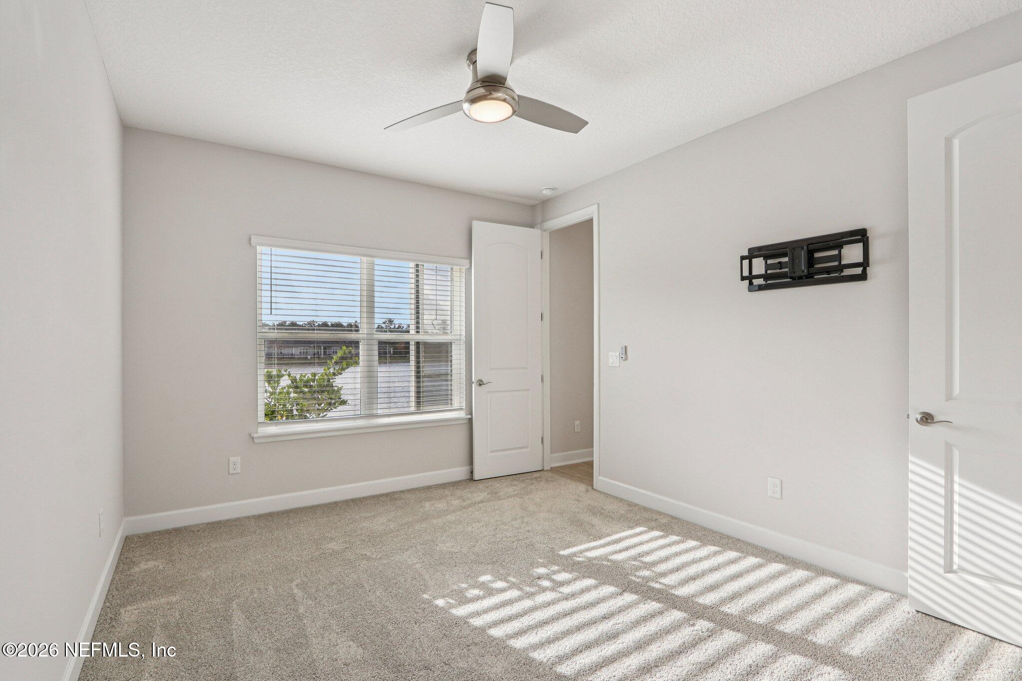 1724 Austin Lk Way Middleburg, FL 32068 - Photo 20 of 61 a view of an empty room with a window