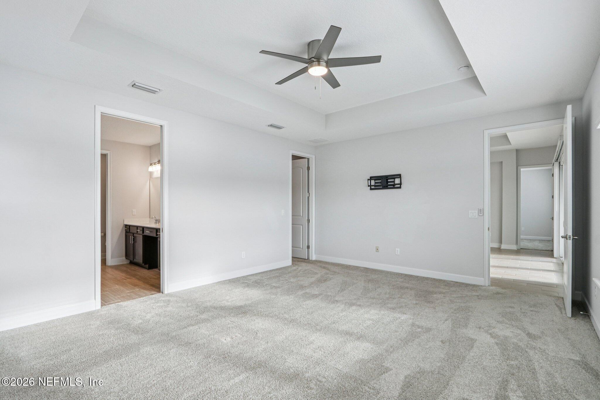 1724 Austin Lk Way Middleburg, FL 32068 - Photo 28 of 61 a view of a livingroom with a ceiling fan and window