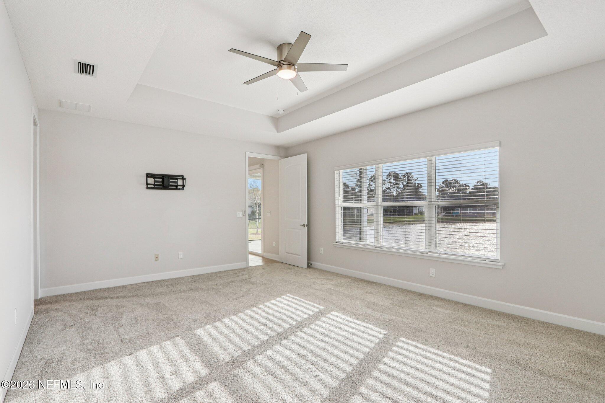 1724 Austin Lk Way Middleburg, FL 32068 - Photo 29 of 61 a view of an empty room with a window