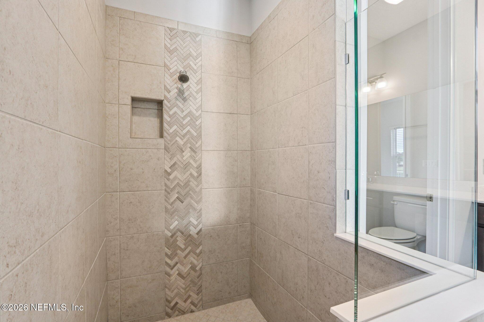 1724 Austin Lk Way Middleburg, FL 32068 - Photo 32 of 61 a bathroom with a shower