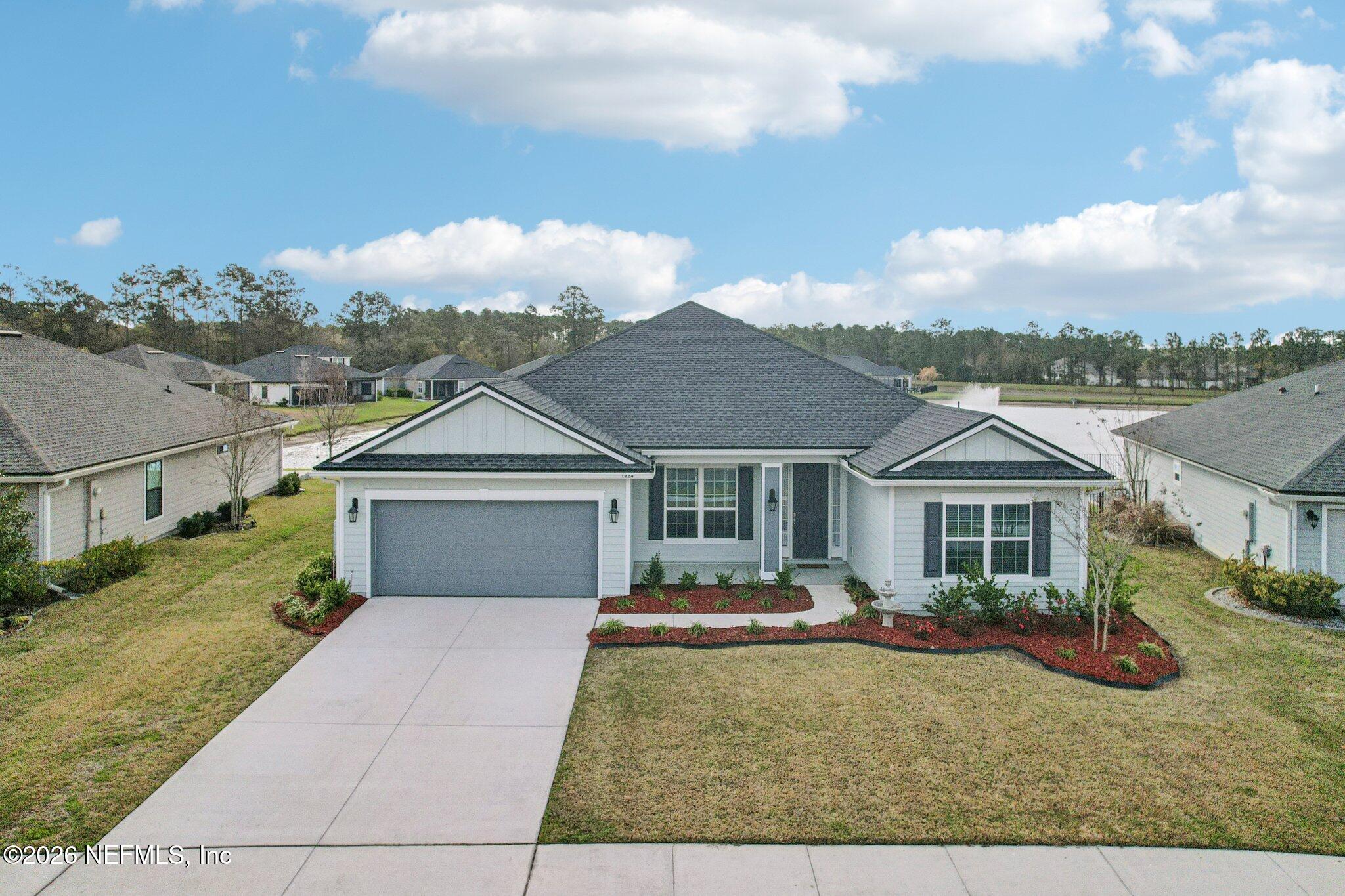 1724 Austin Lk Way Middleburg, FL 32068 - Photo 41 of 61 front view of a house with yard