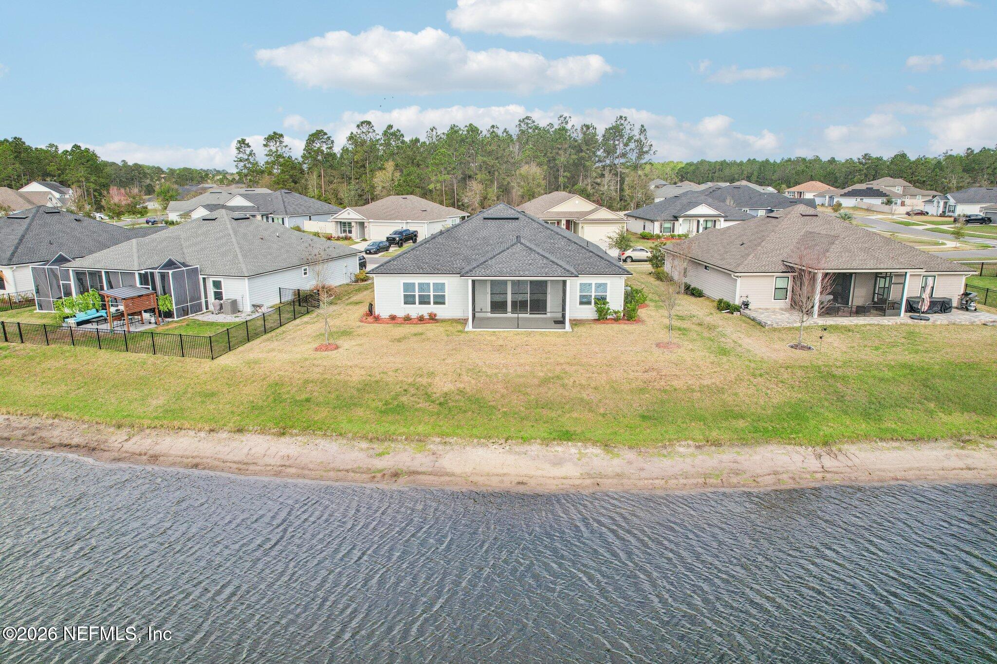 1724 Austin Lk Way Middleburg, FL 32068 - Photo 47 of 61 a view of a city from a big yard
