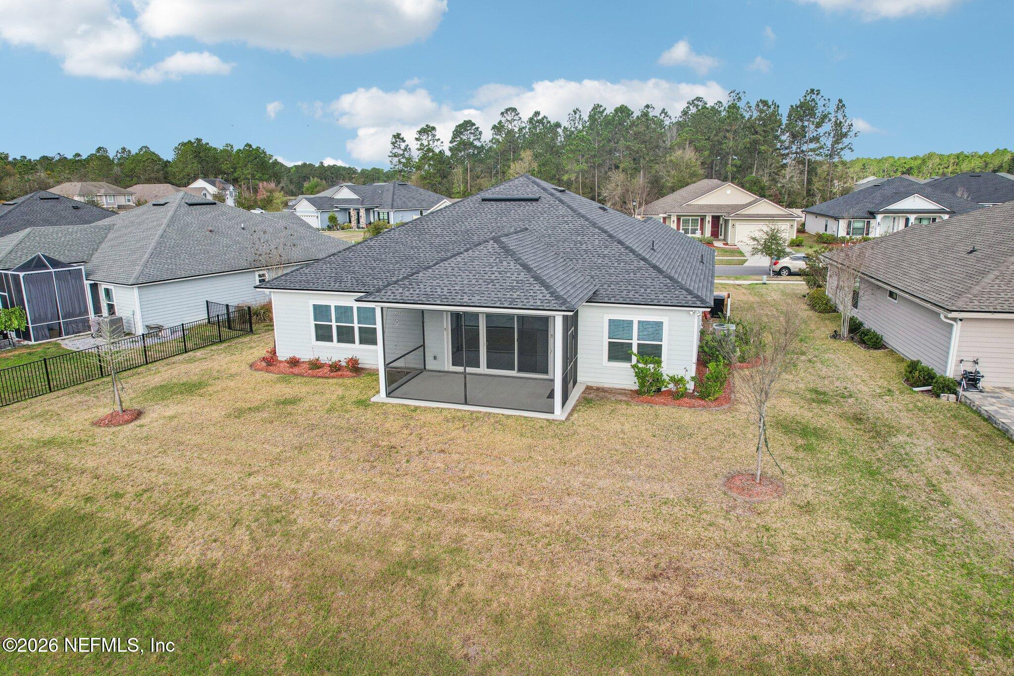 1724 Austin Lk Way Middleburg, FL 32068 - Photo 48 of 61 front view of a house with a yard