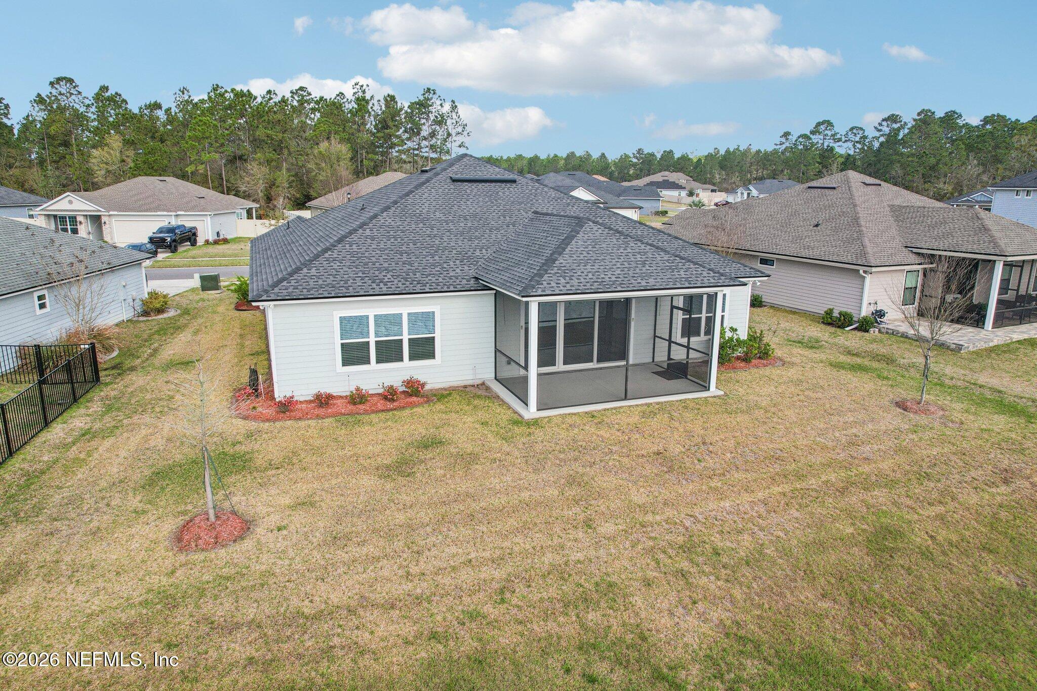 1724 Austin Lk Way Middleburg, FL 32068 - Photo 49 of 61 a view of a house with a backyard