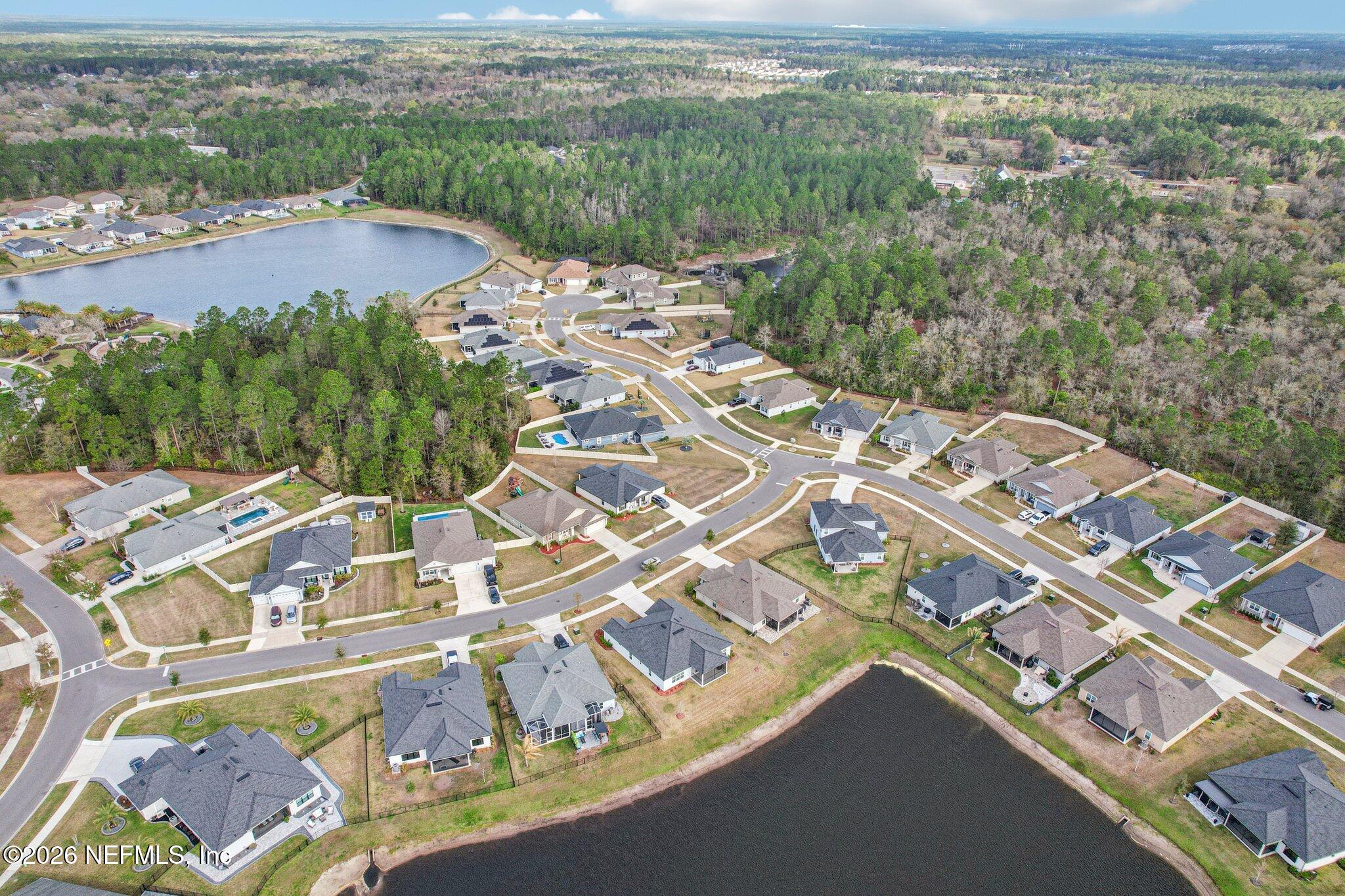 1724 Austin Lk Way Middleburg, FL 32068 - Photo 51 of 61 an aerial view of residential houses with outdoor space