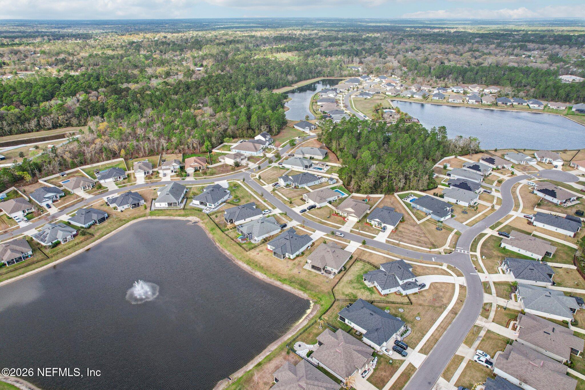 1724 Austin Lk Way Middleburg, FL 32068 - Photo 52 of 61 an aerial view of a house with a lake view