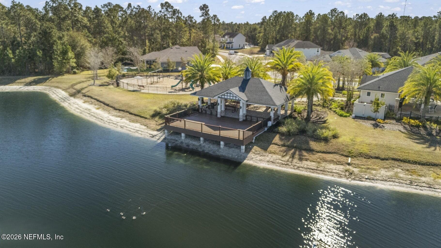 1724 Austin Lk Way Middleburg, FL 32068 - Photo 58 of 61 a view of a lake with houses