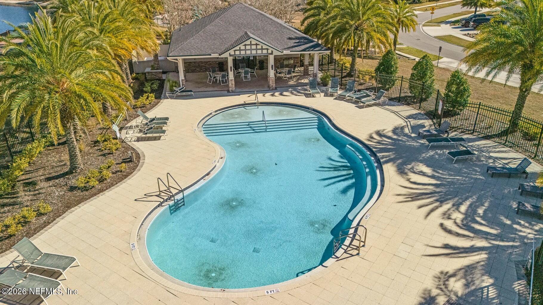 1724 Austin Lk Way Middleburg, FL 32068 - Photo 60 of 61 a view of a swimming pool with a yard