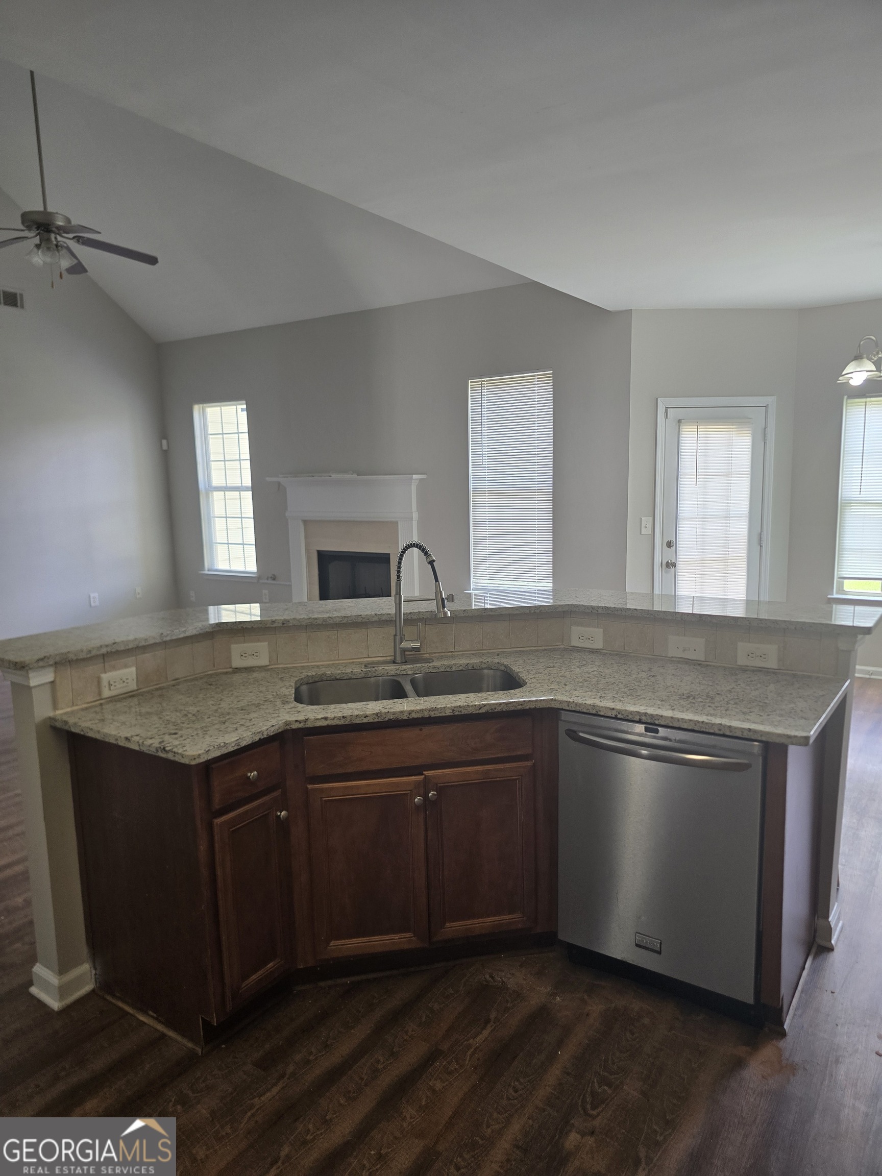30 Vermillion Way Covington, GA 30016 - Photo 12 of 37 a kitchen with a sink and cabinets
