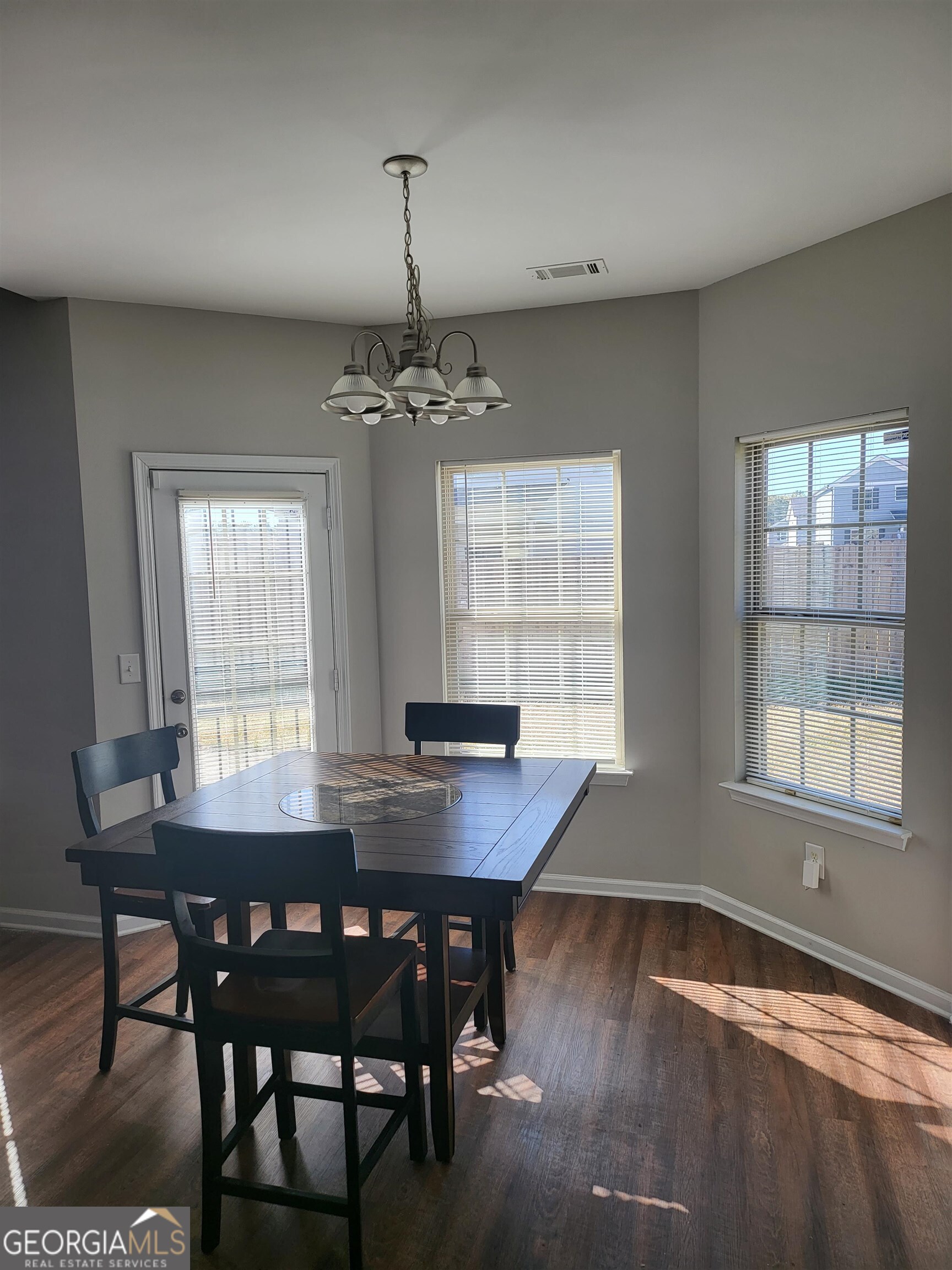 30 Vermillion Way Covington, GA 30016 - Photo 13 of 37 a view of a dining room with furniture and window