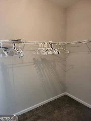 a view of a room with racks on the wall