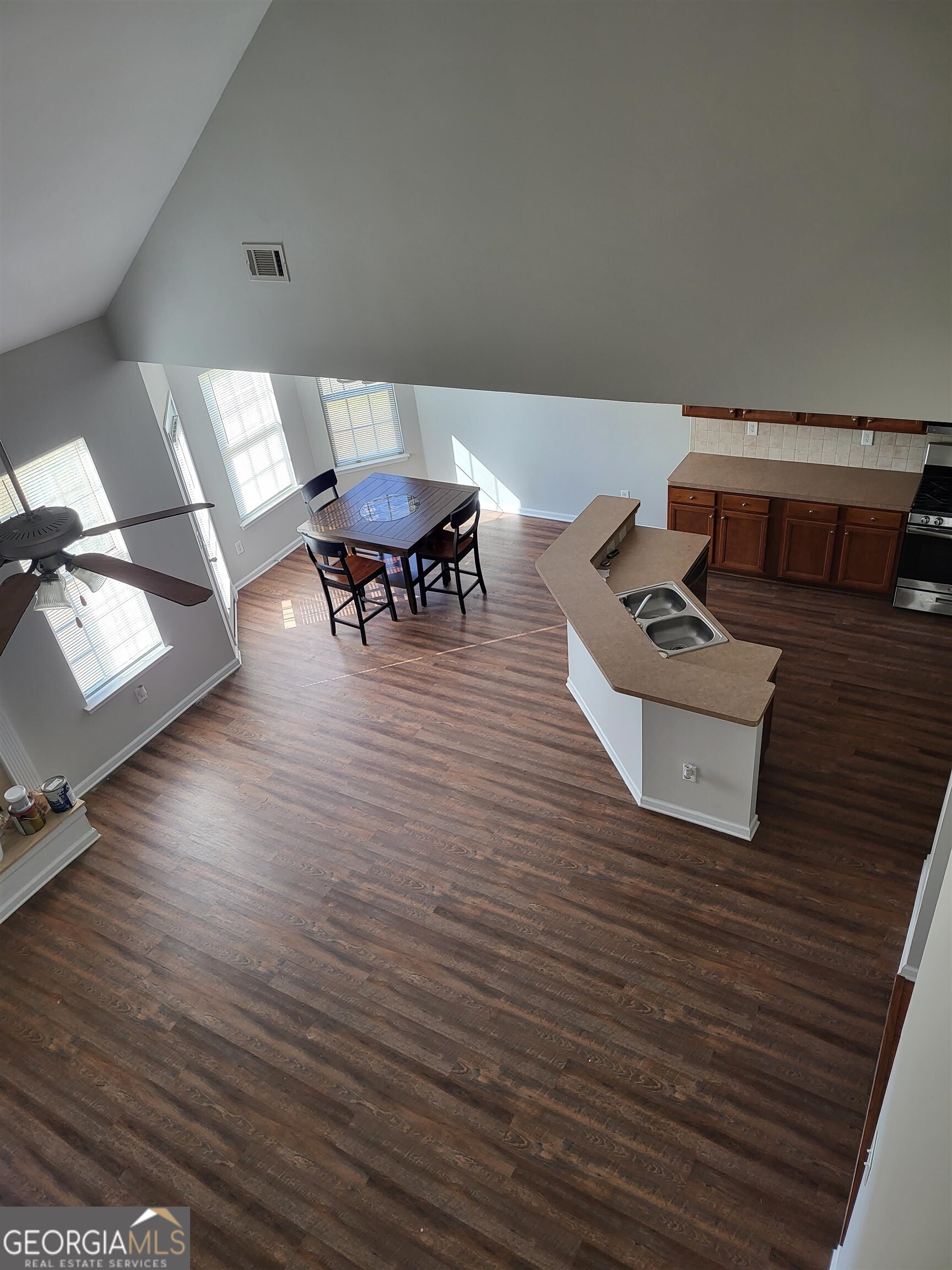 30 Vermillion Way Covington, GA 30016 - Photo 37 of 37 a living room with furniture and a wooden floor