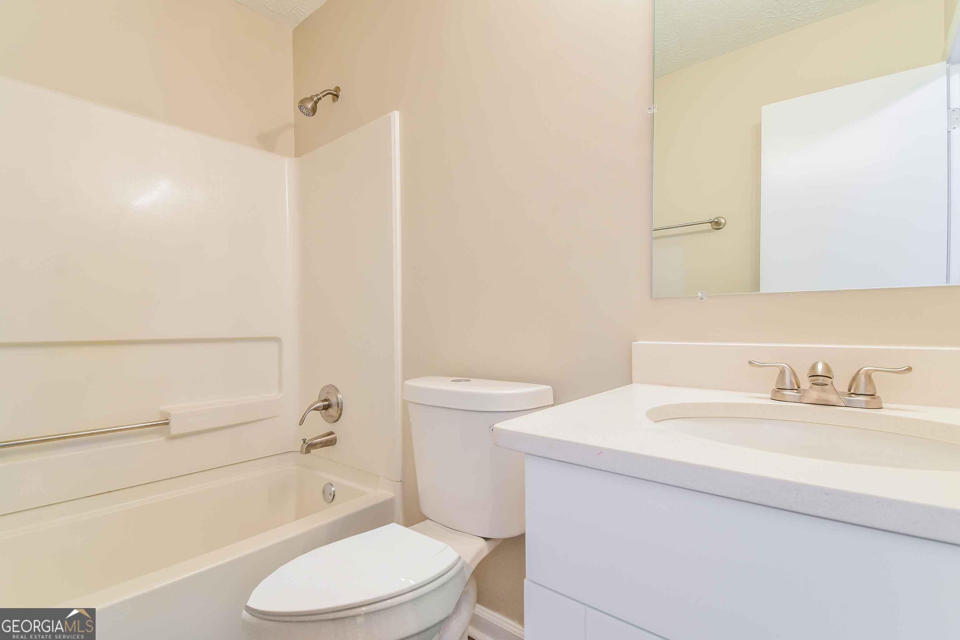 2826 Knollberry Lane Decatur, GA 30034 - Photo 13 of 17 a bathroom with a sink a toilet and shower