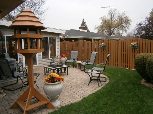 800 Westminster Road Joliet, IL 60435 - Photo 3 of 25 a view of a patio with chair and tables