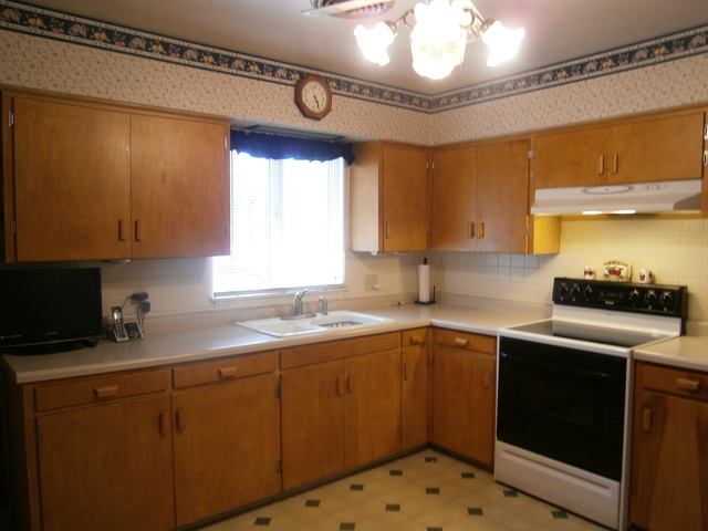 800 Westminster Road Joliet, IL 60435 - Photo 5 of 25 a kitchen with sink cabinets and window