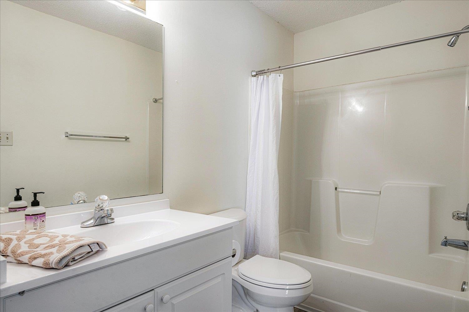 7944 Anne's Circle Memphis, TN 38018 - Photo 12 of 27 a bathroom with a sink a toilet and shower
