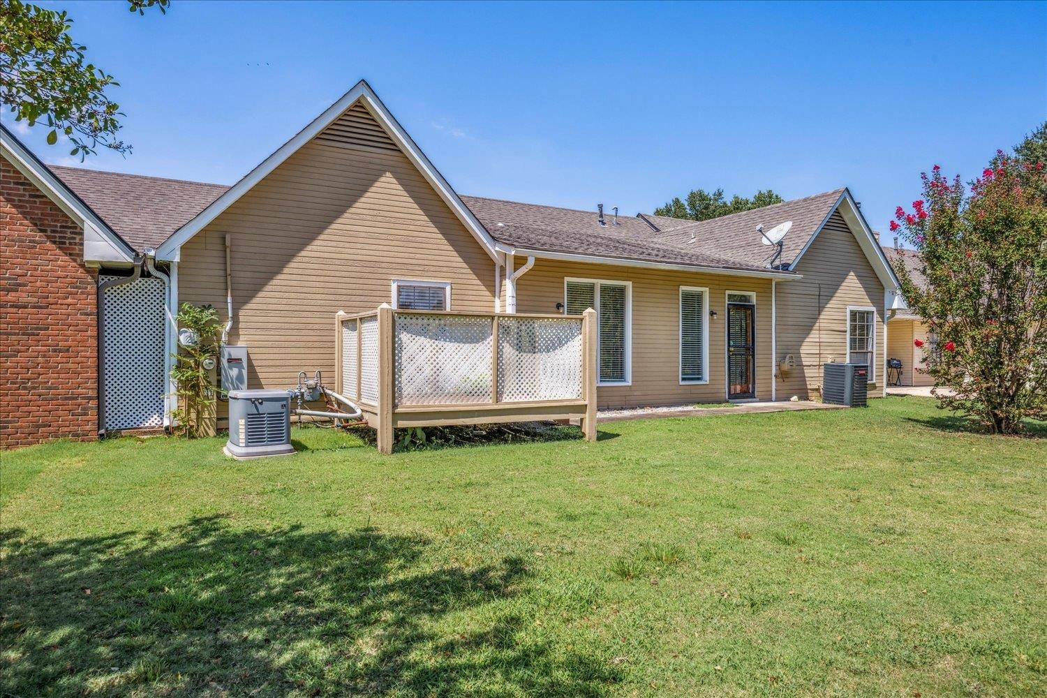 7944 Anne's Circle Memphis, TN 38018 - Photo 22 of 27 a view of a house with a backyard