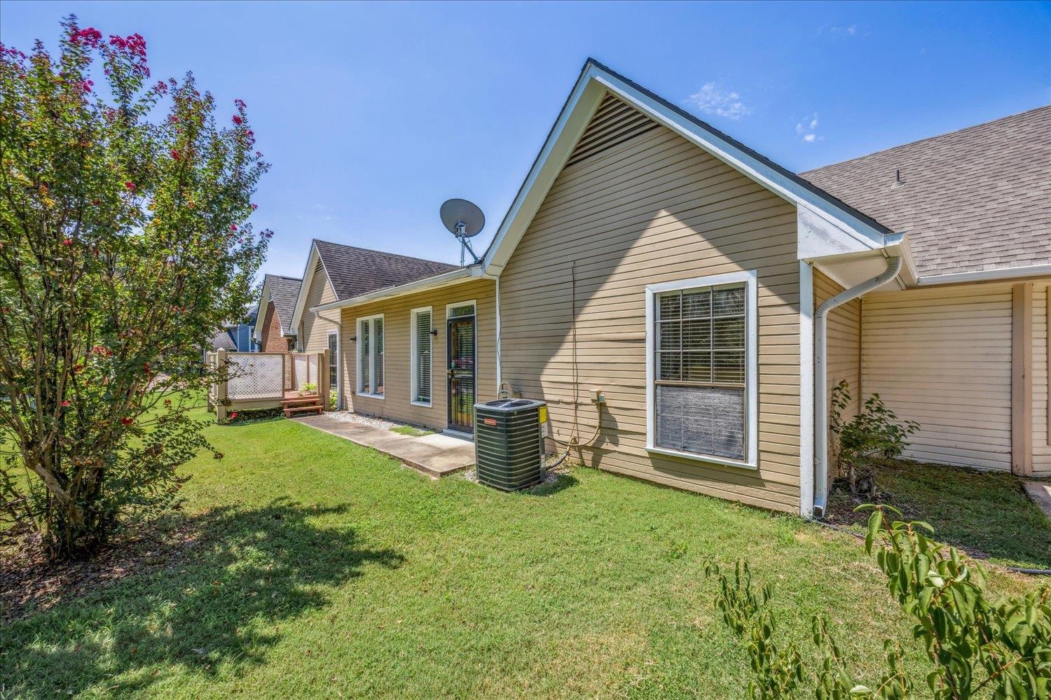 7944 Anne's Circle Memphis, TN 38018 - Photo 23 of 27 a front view of a house with garden
