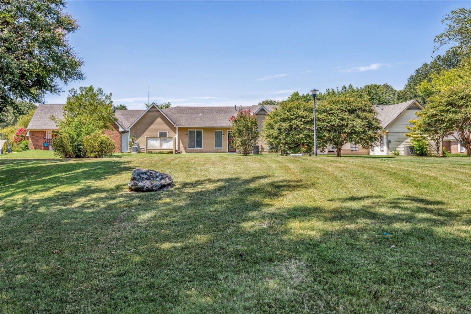 7944 Anne's Circle Memphis, TN 38018 - Photo 27 of 27 a big house with big yard and large trees