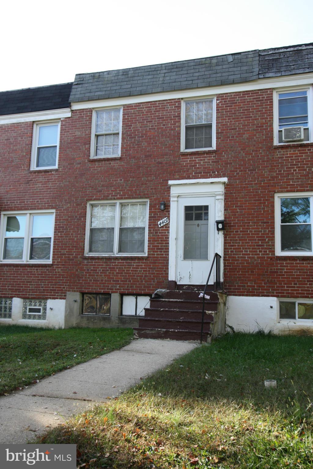 4407 Cedar Garden Road Baltimore, MD 21229 - Photo 1 of 30 a brick building that has a lots of windows in it