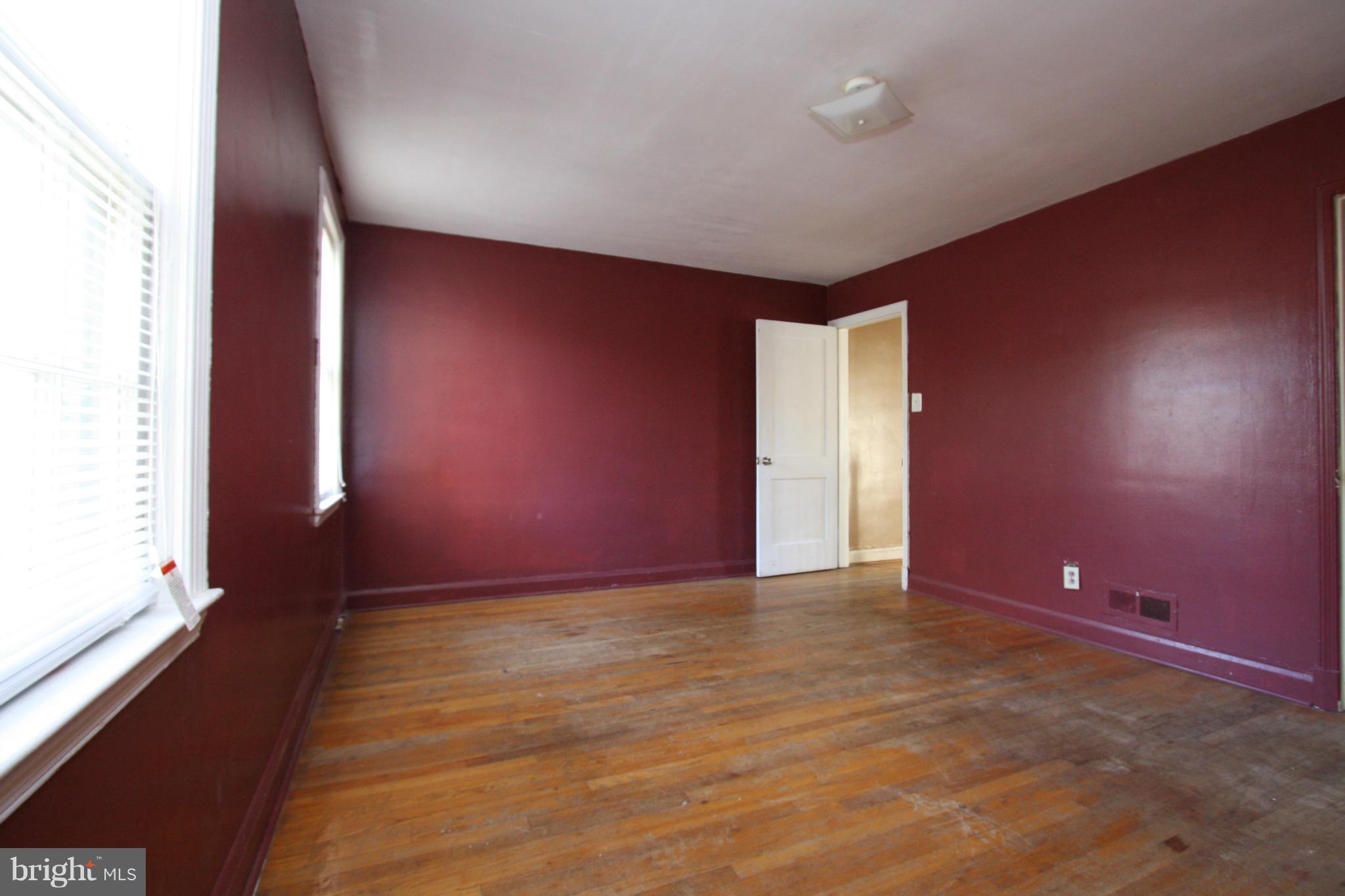 4407 Cedar Garden Road Baltimore, MD 21229 - Photo 14 of 30 an empty room with windows