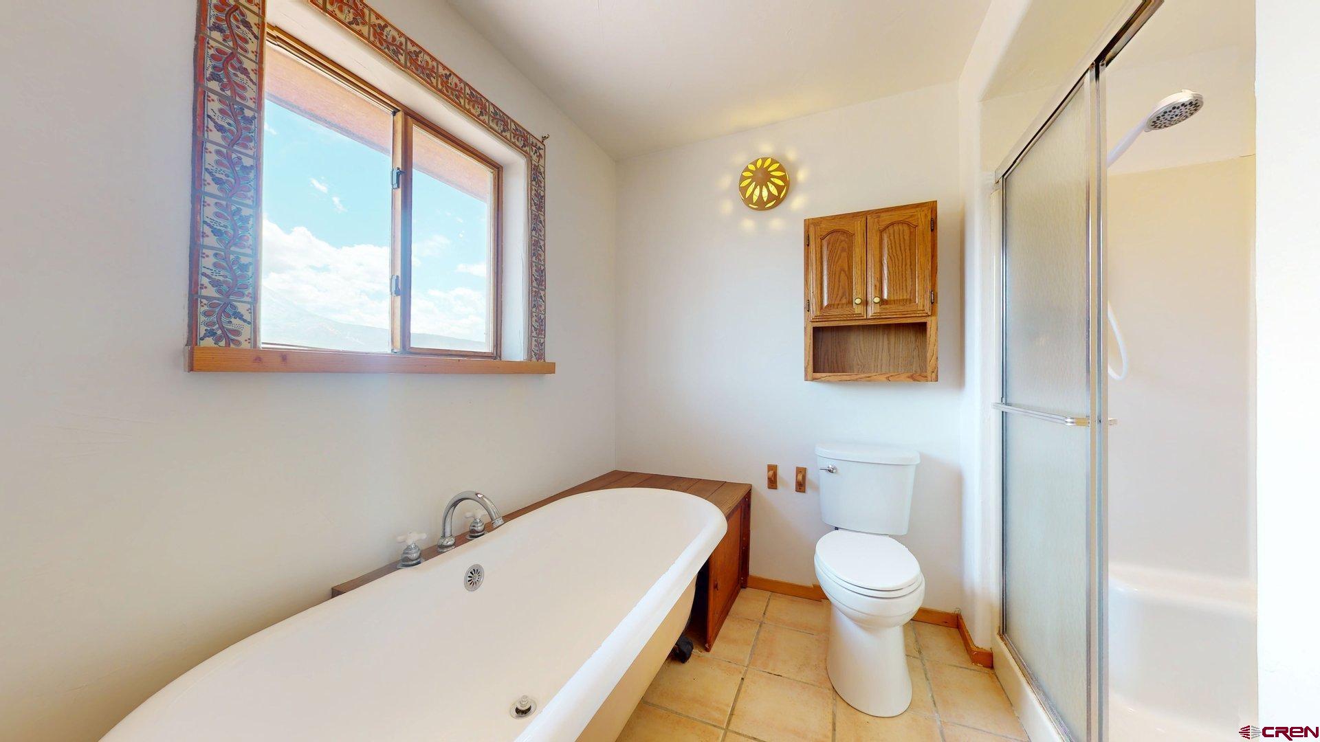 40557 M75 Road Paonia, CO 81428 - Photo 25 of 34 a bathroom with a toilet sink and tub