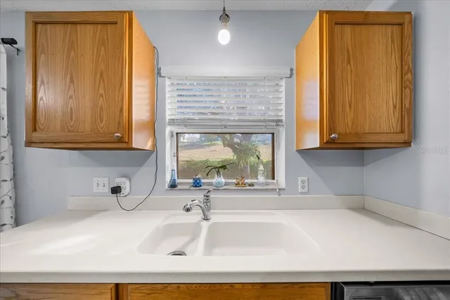 a en suite spacious bathroom with a sink and a mirror