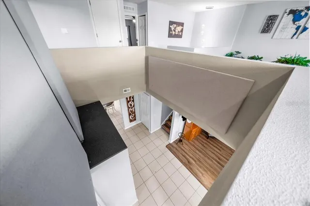 a bathroom with a sink a toilet and shower curtain