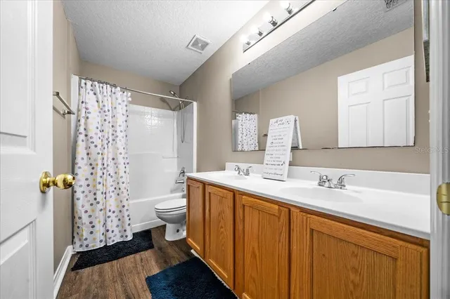 a view of a lake with a city