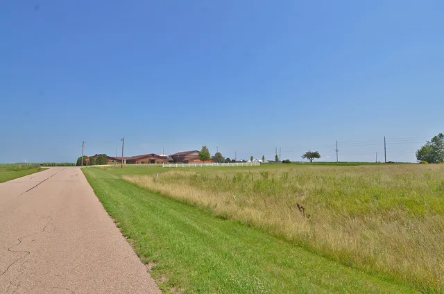 a view of a swimming pool and an outdoor space
