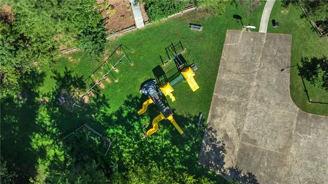 an aerial view of a golf course with plants