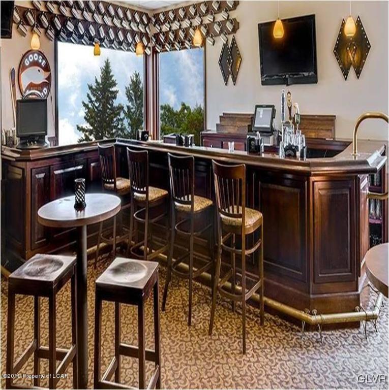 Oak Street Hazleton, PA 18202 - Photo 12 of 25 a table and chairs in a patio