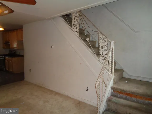 a view of entryway with stairs