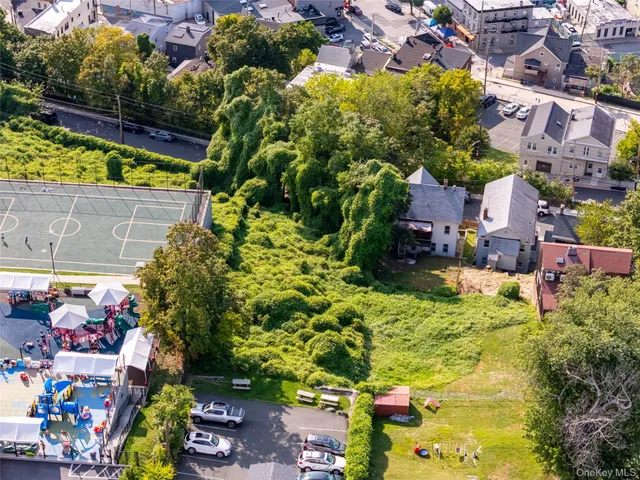 a view of yard with swimming pool