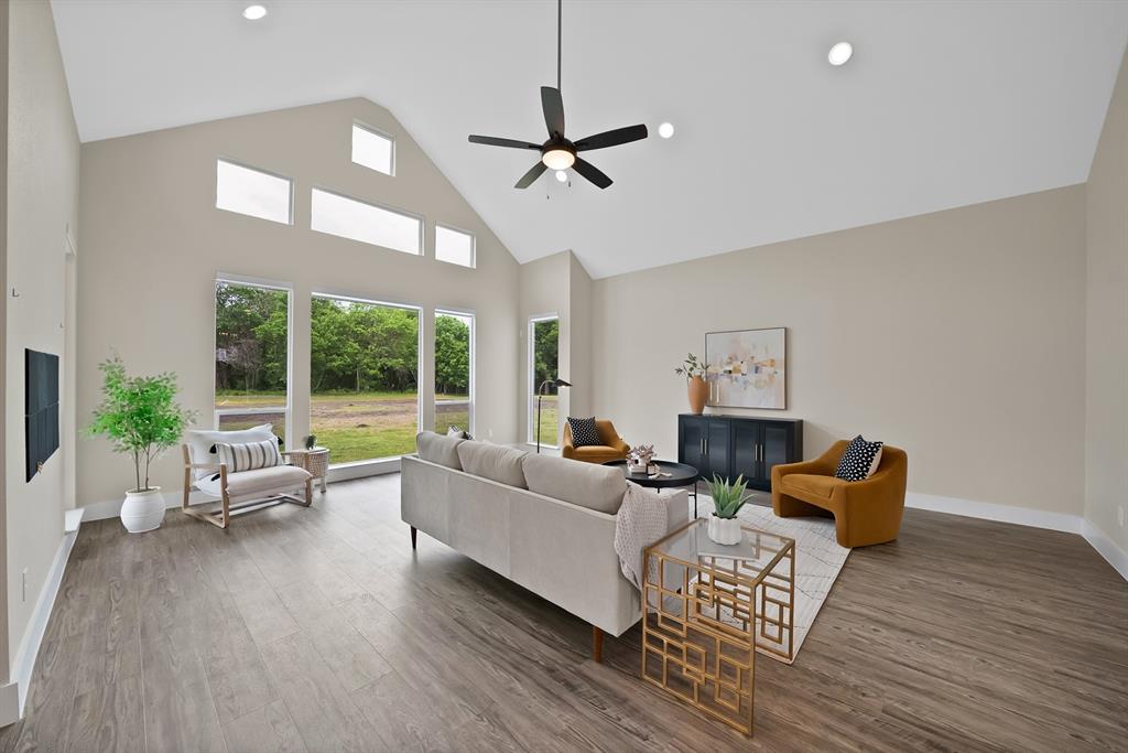 2223 Providence Way Nevada, TX 75173 - Photo 12 of 40 a living room with furniture and a large window