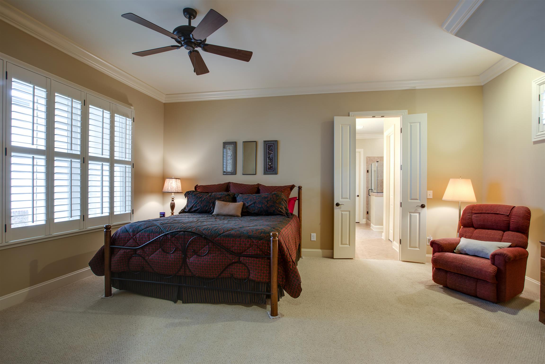 1417 Eliot Road Franklin, TN 37064 - Photo 16 of 29 Relax in this Main Level Master Suite offering berber carpet, large windows with plantation shutters and 10' ceilings.