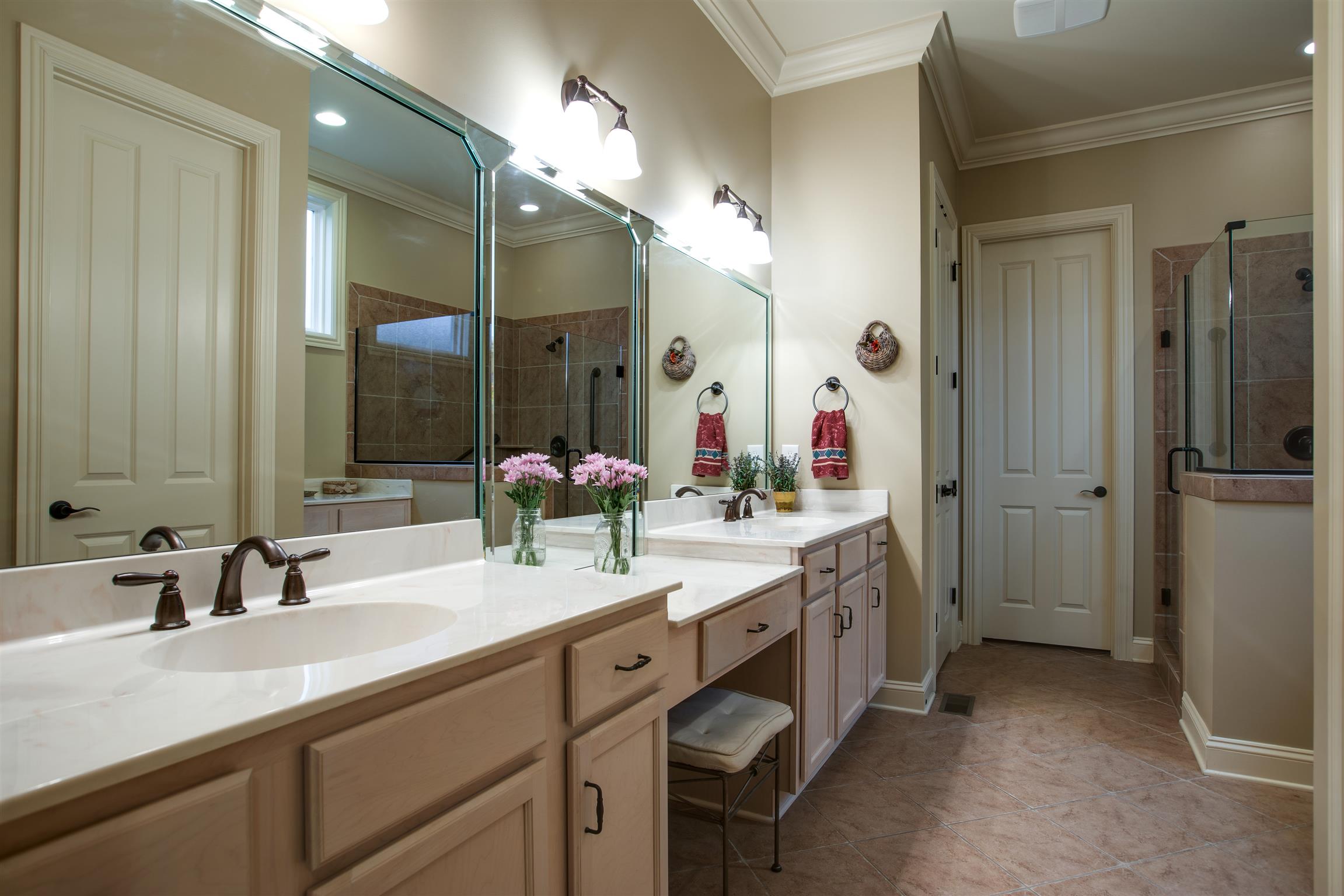 1417 Eliot Road Franklin, TN 37064 - Photo 18 of 29 Master Bath Suite with large tiled shower and tiled bench. Large Double Vanities with Makeup vanity space. The tub was eliminated to increase size of shower and an additional cabinet storage space.