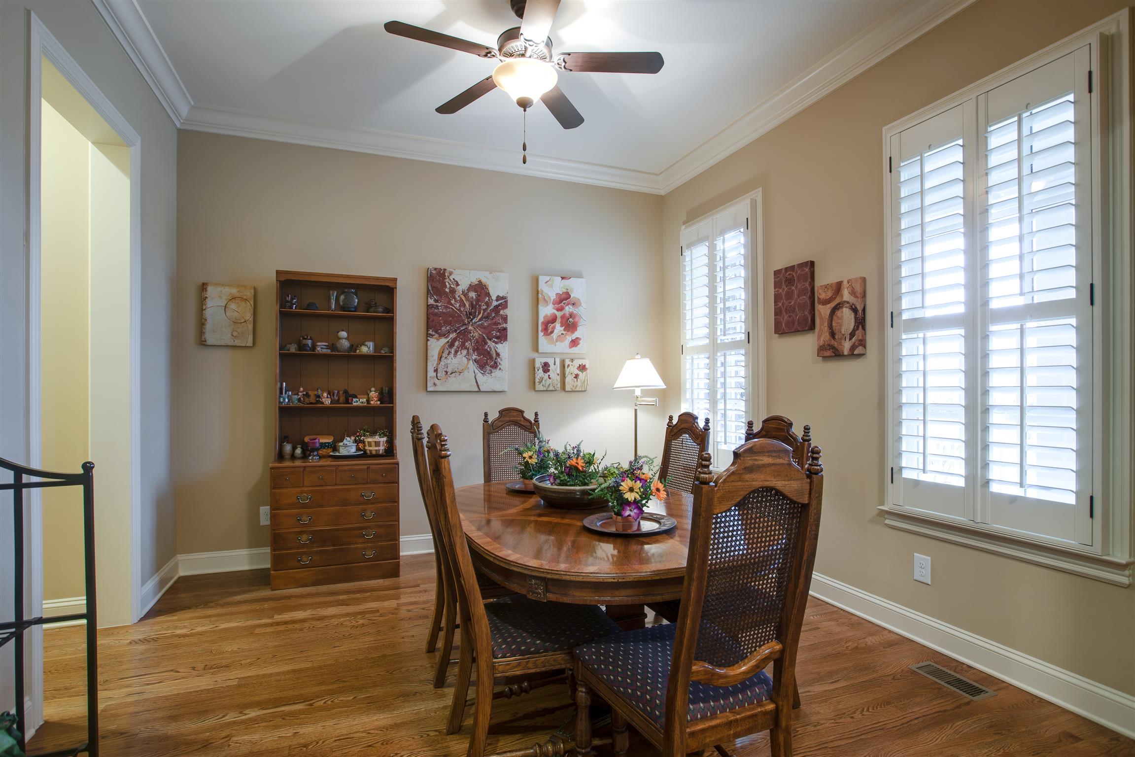 1417 Eliot Road Franklin, TN 37064 - Photo 6 of 29 Formal (or informal) Dining Room showcases the sand and finished hardwood floors you will find downstairs and Plantation Shutters Throughout!