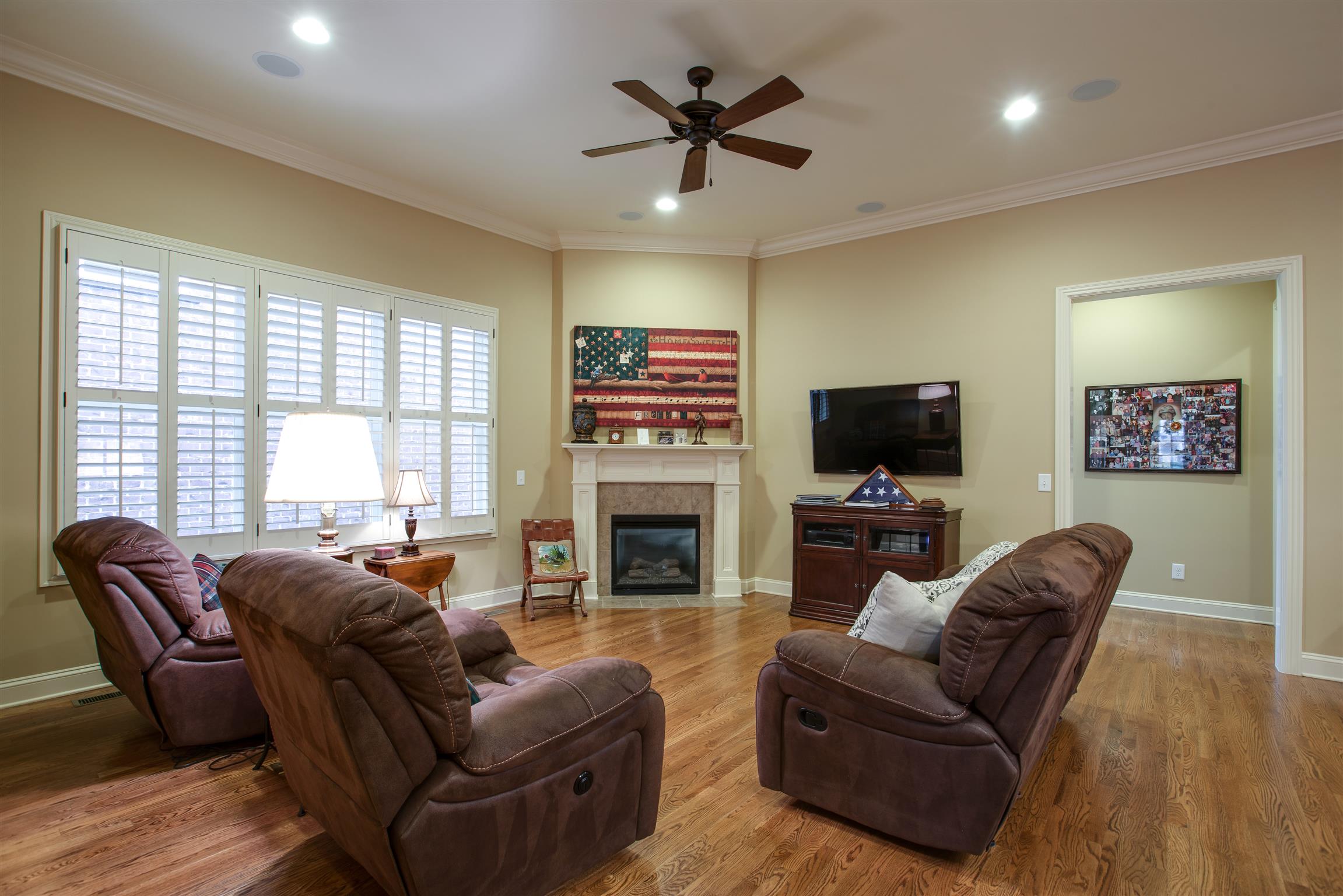 1417 Eliot Road Franklin, TN 37064 - Photo 10 of 29 Family Room has ceiling mount speakers, recessed lighting, gas fireplace, and quadruple window with Plantation Shutters!