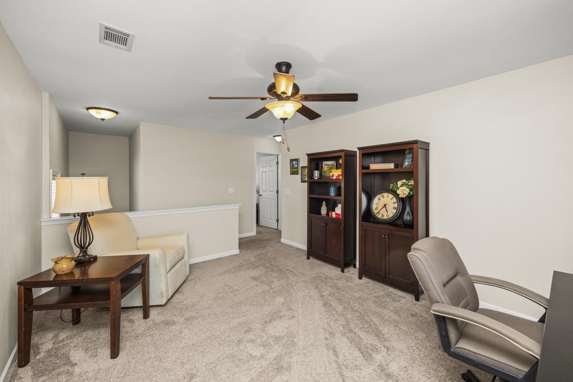 108 Stoddard Street Gallatin, TN 37066 - Photo 18 of 43 a living room with furniture and a chandelier