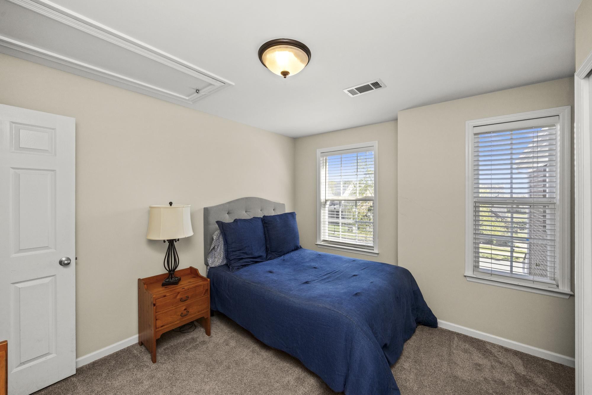 108 Stoddard Street Gallatin, TN 37066 - Photo 27 of 43 a bedroom with a bed and window