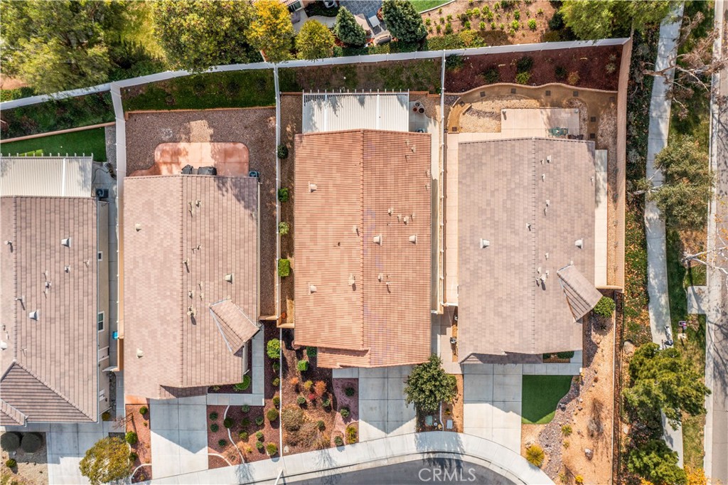 26519 Rim Creek Path Menifee, CA 92584 - Photo 37 of 45 a view of a house with a door and a wooden floor