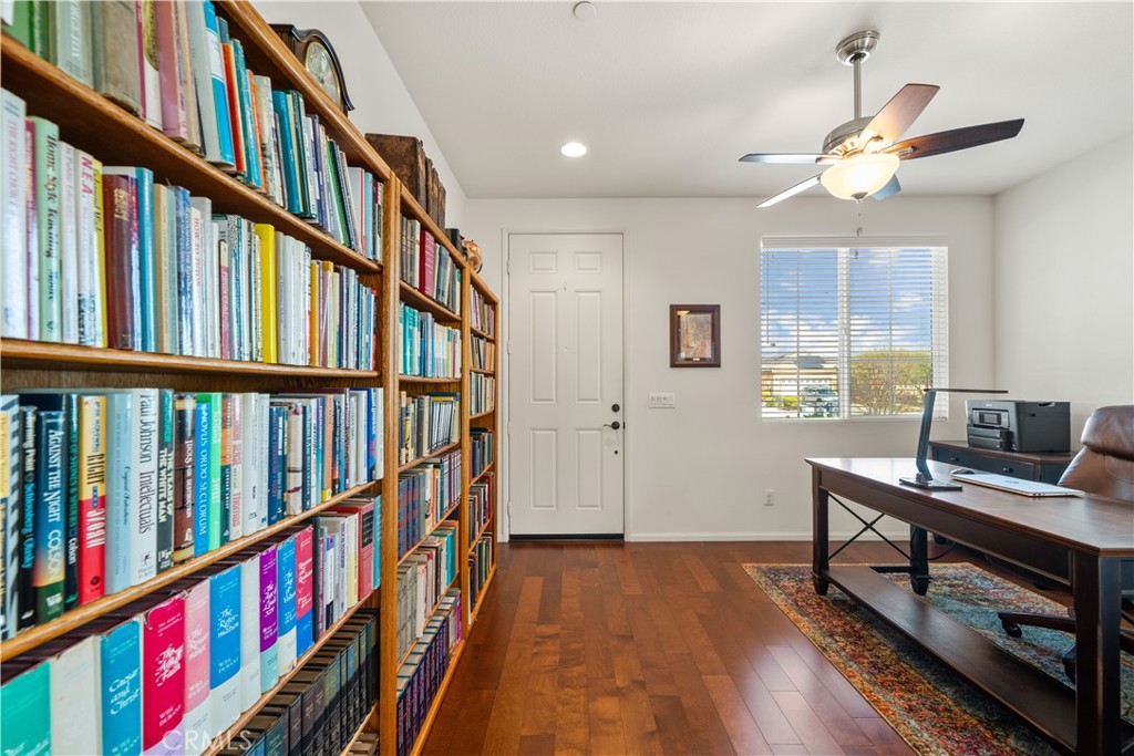 26519 Rim Creek Path Menifee, CA 92584 - Photo 5 of 45 a view of an entryway with wooden floor