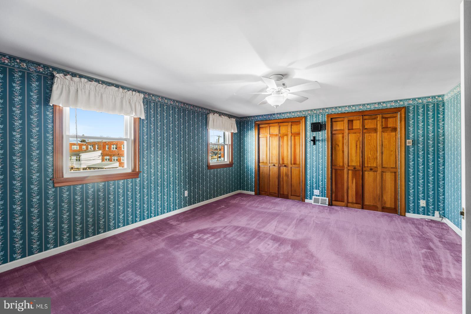 12423 Rambler Road Philadelphia, PA 19154 - Photo 16 of 46 an empty room with windows and fan