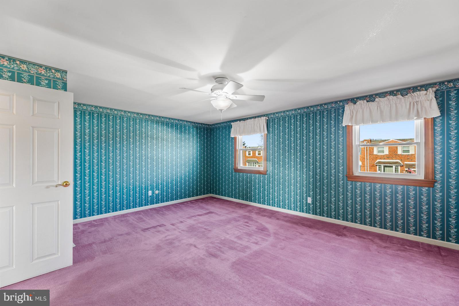 12423 Rambler Road Philadelphia, PA 19154 - Photo 20 of 46 an empty room with windows and fan