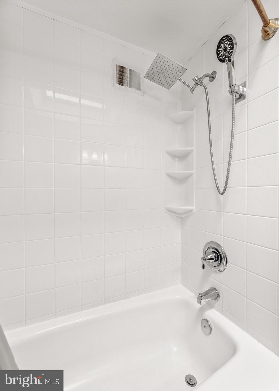 12423 Rambler Road Philadelphia, PA 19154 - Photo 28 of 46 a bathroom with a bath tub with a shower